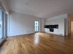 Wohnzimmer mit Einbauküche - Moderne 3-Zimmerwohnung mit Wasserblick. EBK, 2 Balkone