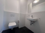 Gäste-WC - Willkommen in der EUROPACITY! Sonnige 3-Zimmerwohnung mit Loggia und EBK