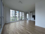 Wohnzimmer - Willkommen in der EUROPACITY! Sonnige 3-Zimmerwohnung mit Loggia und EBK