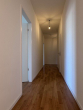 Flur - Helle und freundliche 3-Zimmerwohnung mit Balkon, Loggia und Einbauküche