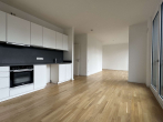 Wohnzimmer - Willkommen in der EUROPACITY! Sonnige 3-Zimmerwohnung mit Balkon und EBK