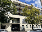 Hausansicht im Sommer - Moderne 2-Zimmerwohnung mit Balkon und EBK nahe Bundeswehrkrankenhaus