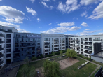 Ausblick Innenhof - Willkommen in der Europacity: kompakte 4-Zimmerwohnung mit offener Einbauküche und Balkon